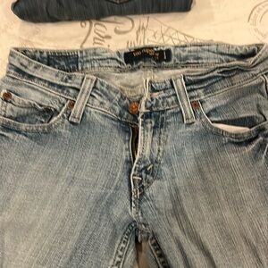 Levi’s distressed faded jeans 524 super low low boot cut